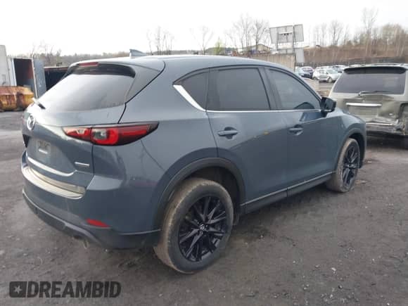 2022 Mazda CX-5 S Carbon Edition z VIN JM3KFBCM9N1538707, wystawiony jako IAAI lot #42026877 z przebiegiem 36 077 mil mil oraz . Historia ofert i sprzedaży dostępna na DreamBid. Obrazek 4.