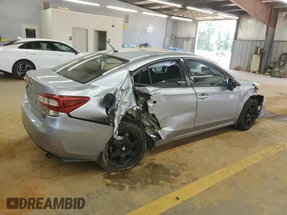 2017 Subaru Impreza с VIN 4S3GKAA68H1613605, выставлен на аукционе Copart как лот 64207335 с пробегом 111 838 миль миль и Списание • Salvage title. История ставок и продаж доступна на DreamBid. Изображение 3.