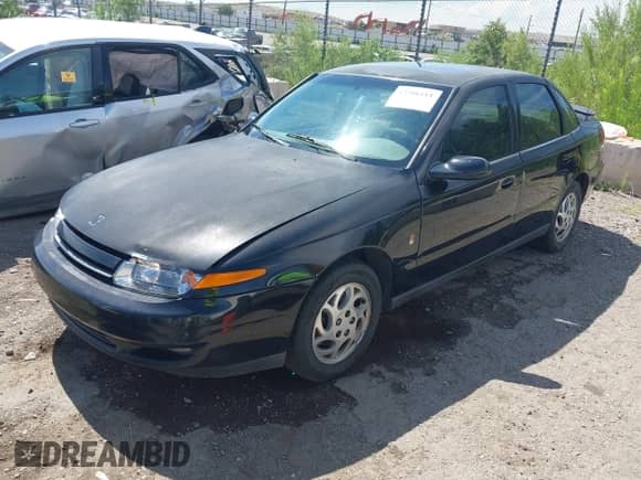 2002 Saturn LS с VIN 1G8JU54F42Y525033, выставлен на аукционе IAAI как лот 42706111 с пробегом 245 226 миль миль и . История ставок и продаж доступна на DreamBid. Изображение 2.