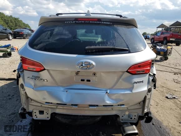 2015 Hyundai Santa Fe с VIN 5XYZU3LB9FG278506, выставлен на аукционе Copart как лот 71102555 с пробегом 163 602 миль миль и Списание • Salvage title. История ставок и продаж доступна на DreamBid. Изображение 6.