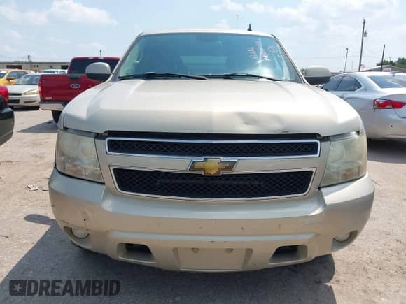 2007 Chevrolet Tahoe LS with VIN 1GNFC13J77R304886, listed as a IAAI auction lot 43078438 with 220,991 mi miles and . Bid and sale history available at DreamBid. Image 6.