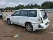 2004 Subaru Forester XT with VIN JF1SG69614H724341, listed as a Copart auction lot 61068405 with 151,830 mi miles and Salvage title. Bid and sale history available at DreamBid. Image 2.