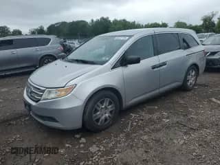2012 Honda Odyssey LX with VIN 5FNRL5H22CB007913, listed as a Copart auction lot 60137725 with 131,489 mi miles and Salvage title. Bid and sale history available at DreamBid. Image 1.