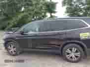 2017 Honda Pilot EX-L with VIN 5FNYF5H61HB018057, listed as a IAAI auction lot 42422940 with 117,111 mi miles and . Bid and sale history available at DreamBid. Image 14.