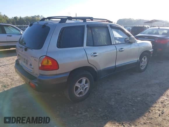 2004 Hyundai Santa Fe GLS z VIN KM8SC73E34U704154, wystawiony jako IAAI lot #43380665 z przebiegiem 68 777 mil mil oraz . Historia ofert i sprzedaży dostępna na DreamBid. Obrazek 4.