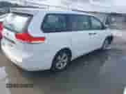 2012 Toyota Sienna with VIN 5TDZK3DC8CS180806, listed as a IAAI auction lot 42401264 with 201,007 mi miles and . Bid and sale history available at DreamBid. Image 4.