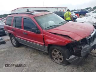 2002 Jeep Grand Cherokee with VIN 1J4GX38S52C154359, listed as a IAAI auction lot 42765362 with 333,596 mi miles and . Bid and sale history available at DreamBid. Image 1.