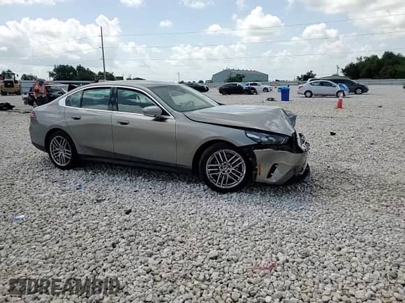 2024 BMW 5 Series 530i with VIN WBA43FJ00RCR13876, listed as a Copart auction lot 61841985 with 17,254 mi miles and Salvage title. Bid and sale history available at DreamBid. Image 13.