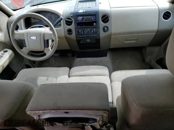 2005 Ford F-150 XLT with VIN 1FTPX12575NA85342, listed as a Copart auction lot 82204225 with 221,143 mi miles and Salvage title. Bid and sale history available at DreamBid. Image 8.