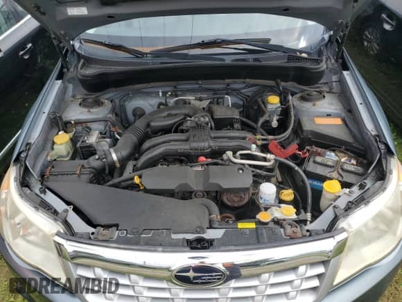 2013 Subaru Forester X Touring z VIN JF2SHAHC2DH427856, wystawiony jako Copart lot #80940655 z przebiegiem 122 842 mil mil oraz Czysty tytuł • Clean title. Historia ofert i sprzedaży dostępna na DreamBid. Obrazek 7.