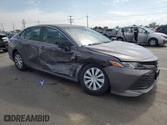 2019 Toyota Camry Hybrid LE с VIN 4T1B31HK3KU006667, выставлен на аукционе Copart как лот 80162455 с пробегом 81 491 миль миль и Списание • Salvage title. История ставок и продаж доступна на DreamBid. Изображение 4.