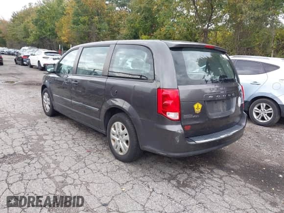 2016 Dodge Grand Caravan SE with VIN 2C4RDGBG1GR154621, listed as a IAAI auction lot 43407585 with 121,271 mi miles and . Bid and sale history available at DreamBid. Image 3.