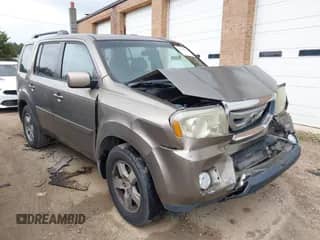 2009 Honda Pilot EX with VIN 5FNYF38459B019460, listed as a IAAI auction lot 42964763 with 203,760 mi miles and . Bid and sale history available at DreamBid. Image 1.