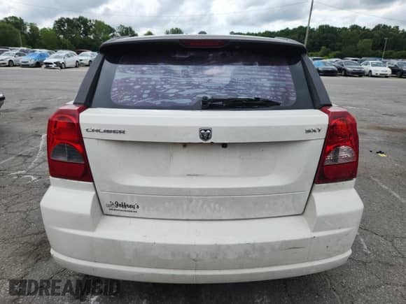 2008 Dodge Caliber SXT with VIN 1B3HB48B58D652564, listed as a Copart auction lot 67326905 with 143,885 mi miles and Salvage title. Bid and sale history available at DreamBid. Image 6.