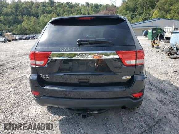 2012 Jeep Grand Cherokee Laredo z VIN 1C4RJFAG2CC209133, wystawiony jako Copart lot #81589965 z przebiegiem 90 232 mil mil oraz Szkoda całkowita • Salvage title. Historia ofert i sprzedaży dostępna na DreamBid. Obrazek 6.