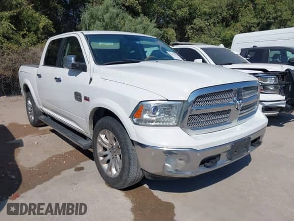 2014 Ram 1500 Longhorn with VIN 1C6RR7PT1ES143869, listed as a IAAI auction lot 43433379 with 131,727 mi miles and . Bid and sale history available at DreamBid. Image 1.