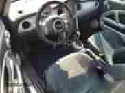 2004 MINI Hardtop with VIN WMWRC33454TJ56308, listed as a Copart auction lot 59690865 with 99,374 mi miles and Salvage title. Bid and sale history available at DreamBid. Image 8.