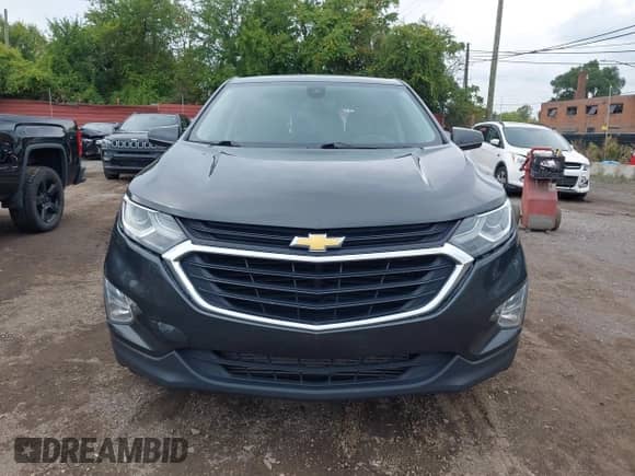2019 Chevrolet Equinox LT z VIN 2GNAXJEV4K6264303, wystawiony jako IAAI lot #43293021 z przebiegiem 146 840 mil mil oraz . Historia ofert i sprzedaży dostępna na DreamBid. Obrazek 13.