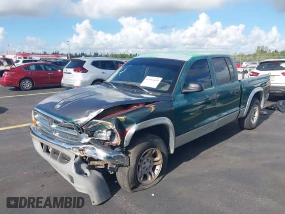 2003 Dodge Dakota SLT z VIN 1D7HL48N63S126377, wystawiony jako IAAI lot #42512610 z przebiegiem 202 720 mil mil oraz . Historia ofert i sprzedaży dostępna na DreamBid. Obrazek 2.