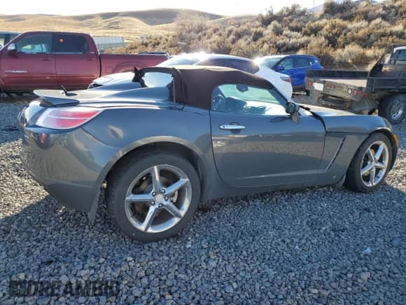 2009 Saturn Sky Red Line с VIN 1G8MT35X09Y106005, выставлен на аукционе Copart как лот 81554004 с пробегом 76 054 миль миль и Списание • Salvage title. История ставок и продаж доступна на DreamBid. Изображение 3.