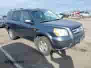 2006 Honda Pilot EX-L with VIN 5FNYF28796B026606, listed as a IAAI auction lot 41612560 with 224,577 mi miles and . Bid and sale history available at DreamBid. Image 1.