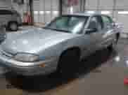 1997 Chevrolet Lumina z VIN 2G1WL52M1V9132379, wystawiony jako IAAI lot #41289812 z przebiegiem 150 062 mil mil oraz . Historia ofert i sprzedaży dostępna na DreamBid. Obrazek 2.