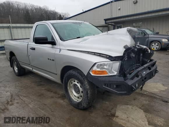 2010 Dodge 1500 ST with VIN 3D7JB1EK3AG103947, listed as a Copart auction lot 87154344 with 117,455 mi miles and Salvage title. Bid and sale history available at DreamBid. Image 4.