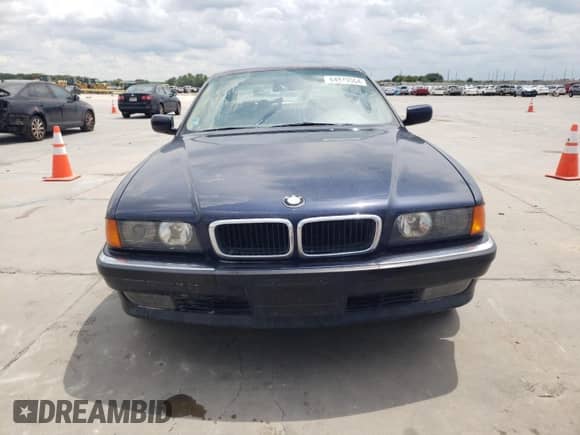 1997 BMW 7 Series 740iL with VIN WBAGJ8324VDM02317, listed as a Copart auction lot 64879564 with 107,365 mi miles and Salvage title. Bid and sale history available at DreamBid. Image 5.