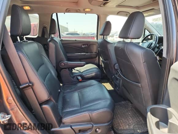 2020 Honda Pilot Elite z VIN 5FNYF6H02LB032625, wystawiony jako Copart lot #69782685 z przebiegiem 68 084 mil mil oraz Czysty tytuł • Clean title. Historia ofert i sprzedaży dostępna na DreamBid. Obrazek 11.