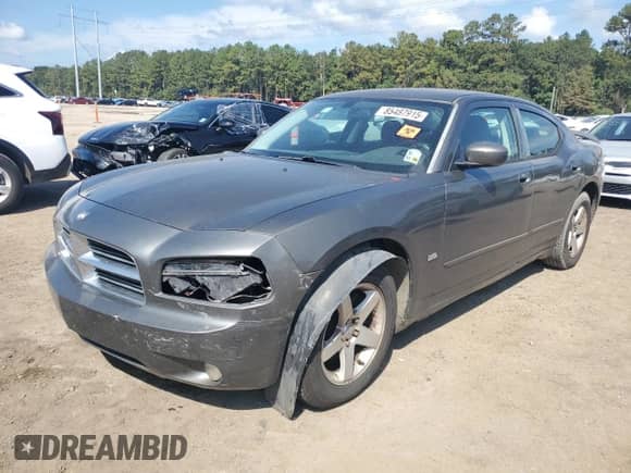 2010 Dodge Charger SXT with VIN 2B3CA3CVXAH155835, listed as a Copart auction lot 85487915 with 255,837 mi miles and Salvage title. Bid and sale history available at DreamBid. Image 1.