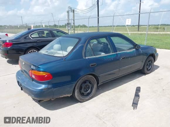2002 Chevrolet Prizm z VIN 1Y1SK52802Z419527, wystawiony jako IAAI lot #42549797 z przebiegiem Nie podano mil oraz . Historia ofert i sprzedaży dostępna na DreamBid. Obrazek 4.