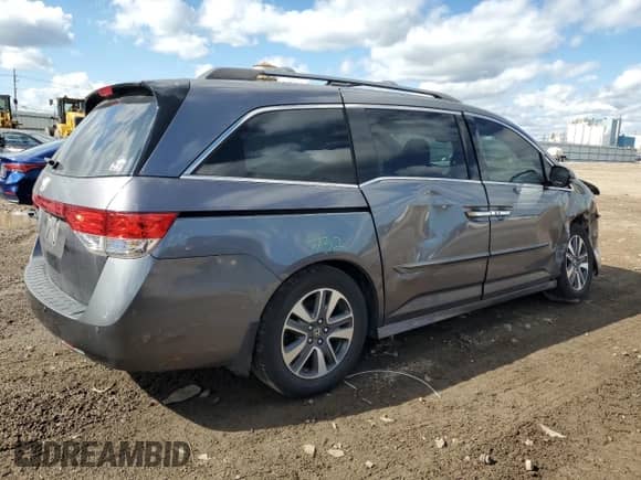 2016 Honda Odyssey Touring Elite с VIN 5FNRL5H9XGB054819, выставлен на аукционе Copart как лот 82267055 с пробегом 137 106 миль миль и Списание • Salvage title. История ставок и продаж доступна на DreamBid. Изображение 3.