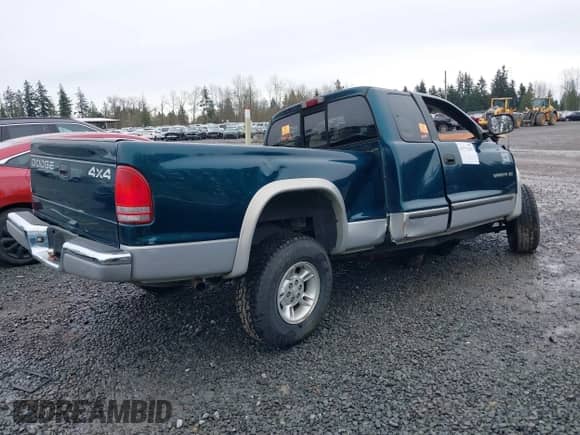 1997 Dodge Dakota z VIN 1B7GG23X9VS242604, wystawiony jako IAAI lot #41772203 z przebiegiem Nie podano mil oraz . Historia ofert i sprzedaży dostępna na DreamBid. Obrazek 4.