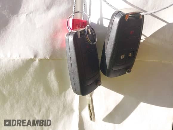 2016 Chevrolet Trax LS z VIN KL7CJNSB4GB595940, wystawiony jako IAAI lot #42770245 z przebiegiem 198 253 mil mil oraz . Historia ofert i sprzedaży dostępna na DreamBid. Obrazek 11.