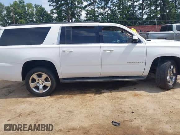 2015 Chevrolet Suburban LT z VIN 1GNSCJKC4FR298108, wystawiony jako IAAI lot #42649373 z przebiegiem 150 155 mil mil oraz . Historia ofert i sprzedaży dostępna na DreamBid. Obrazek 14.