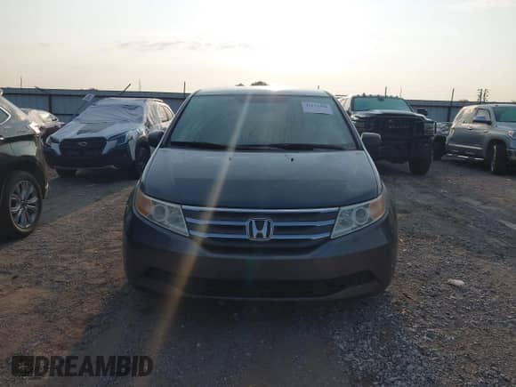 2012 Honda Odyssey LX z VIN 5FNRL5H2XCB065719, wystawiony jako IAAI lot #43173490 z przebiegiem 242 271 mil mil oraz . Historia ofert i sprzedaży dostępna na DreamBid. Obrazek 13.
