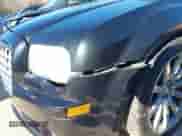 2006 Chrysler 300 C SRT-8 with VIN 2C3LA73W06H216409, listed as a IAAI auction lot 41588832 with 187,662 mi miles and . Bid and sale history available at DreamBid. Image 6.