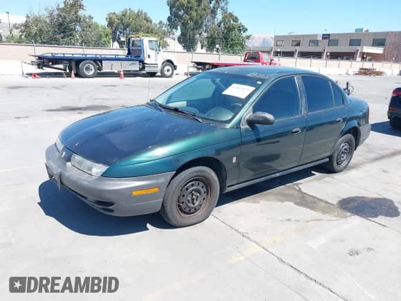 1997 Saturn SL with VIN 1G8ZH5289VZ247272, listed as a IAAI auction lot 42987029 with 177,970 mi miles and . Bid and sale history available at DreamBid. Image 2.
