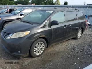 2011 Toyota Sienna XLE AAS with VIN 5TDYK3DC5BS098350, listed as a Copart auction lot 66857455 with 213,996 mi miles and Clean title. Bid and sale history available at DreamBid. Image 1.