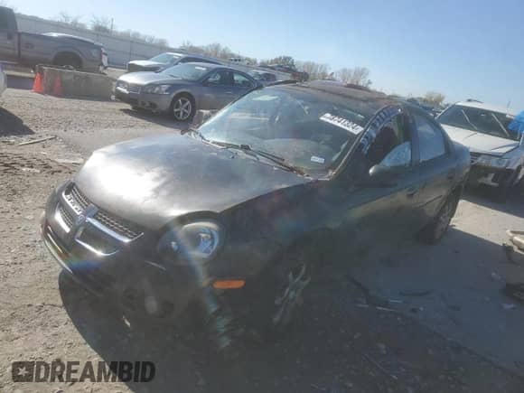 2004 Dodge Neon SXT z VIN 1B3ES56C64D585651, wystawiony jako Copart lot #78741324 z przebiegiem Nie podano mil oraz Szkoda całkowita • Salvage title. Historia ofert i sprzedaży dostępna na DreamBid. Obrazek 1.
