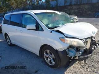 2013 Toyota Sienna LE AAS with VIN 5TDKK3DC9DS329548, listed as a IAAI auction lot 43460866 with 190,352 mi miles and . Bid and sale history available at DreamBid. Image 1.