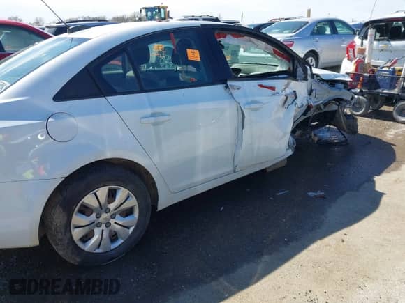 2015 Chevrolet Cruze LS with VIN 1G1PB5SHXF7231716, listed as a IAAI auction lot 41764515 with 200,094 mi miles and . Bid and sale history available at DreamBid. Image 13.