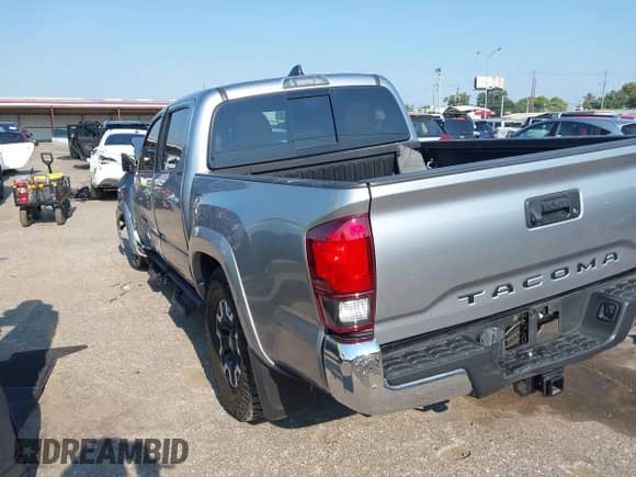 2022 Toyota Tacoma SR5 with VIN 3TMAZ5CN3NM194543, listed as a IAAI auction lot 43031222 with 21,800 mi miles and . Bid and sale history available at DreamBid. Image 3.