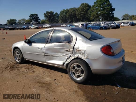 2002 Dodge Neon with VIN 1B3ES26C32D583044, listed as a Copart auction lot 74057444 with 205,484 mi miles and Salvage title. Bid and sale history available at DreamBid. Image 2.