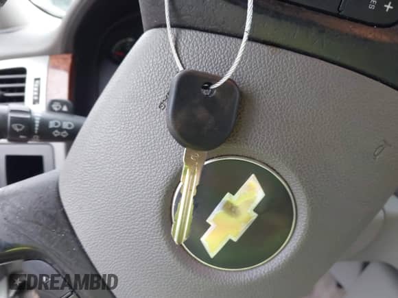 2007 Chevrolet Tahoe LS z VIN 1GNFC13J07J120985, wystawiony jako IAAI lot #43466508 z przebiegiem 190 883 mil mil oraz . Historia ofert i sprzedaży dostępna na DreamBid. Obrazek 11.