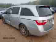 2013 Honda Odyssey EX-L with VIN 5FNRL5H64DB020229, listed as a IAAI auction lot 43119656 with 149,509 mi miles and . Bid and sale history available at DreamBid. Image 3.