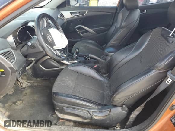 2013 Hyundai Veloster w/Black Int с VIN KMHTC6AD9DU094754, выставлен на аукционе Copart как лот 64644975 с пробегом 165 871 миль миль и Списание • Salvage title. История ставок и продаж доступна на DreamBid. Изображение 7.