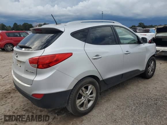 2012 Hyundai Tucson GLS with VIN KM8JU3AC2CU487407, listed as a Copart auction lot 81846875 with 157,986 mi miles and Clean title. Bid and sale history available at DreamBid. Image 3.