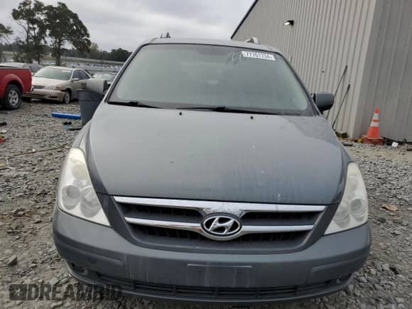 2007 Hyundai Entourage GLS with VIN KNDMC233676034624, listed as a Copart auction lot 77761734 with 215,206 mi miles and Salvage title. Bid and sale history available at DreamBid. Image 5.