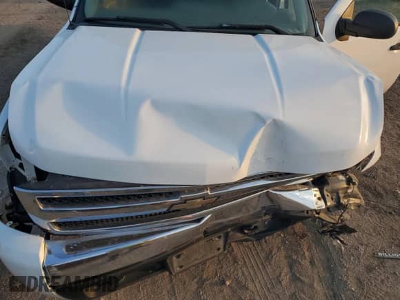 2011 Chevrolet Silverado 1500 Work Truck z VIN 1GCRKPE36BZ334402, wystawiony jako Copart lot #80905345 z przebiegiem 189 787 mil mil oraz Szkoda całkowita • Salvage title. Historia ofert i sprzedaży dostępna na DreamBid. Obrazek 11.